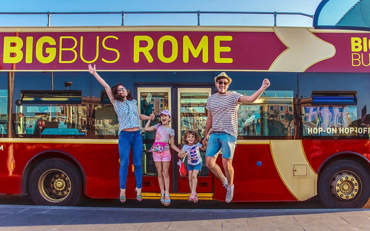 Big Bus double-decker in front of the Colosseum, Rome
