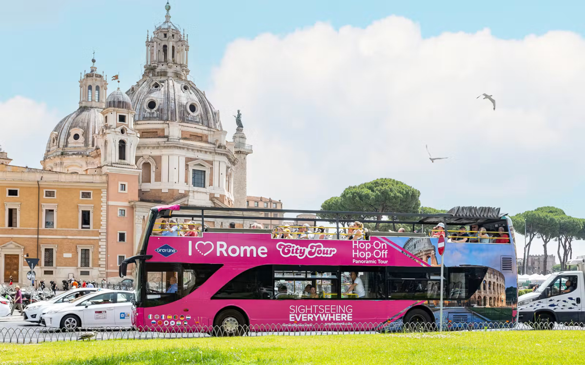 Pink I Love Rome double-decker bus in Rome
